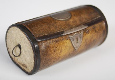 Lot 265 - A leather cylindrical snuff box in the form of...