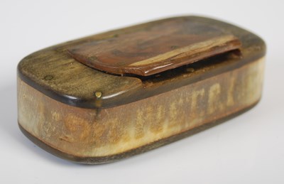 Lot 213 - A horn oblong snuff box, the hinged cover with...