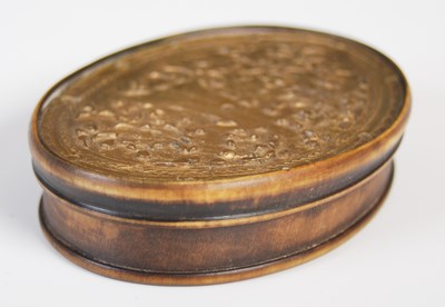 Lot 289 - A pressed horn oval snuff box, the detachable...