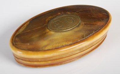 Lot 210 - A horn oval snuff box, the detachable cover...