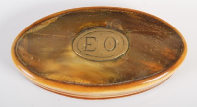 Lot 210 - A horn oval snuff box, the detachable cover...
