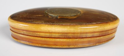 Lot 210 - A horn oval snuff box, the detachable cover...