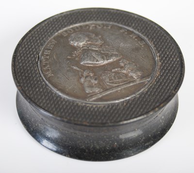 Lot 253 - A black pressed horn circular snuff box, the...