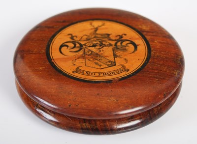 Lot 220 - A treen circular snuff box in finely grained...