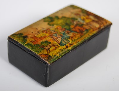 Lot 206 - A black lacquer papier-mâché oblong snuff box,...