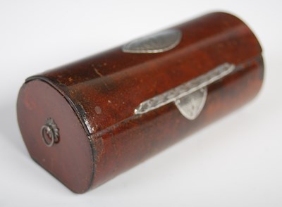 Lot 276 - A leather cylindrical snuff box in the form of...