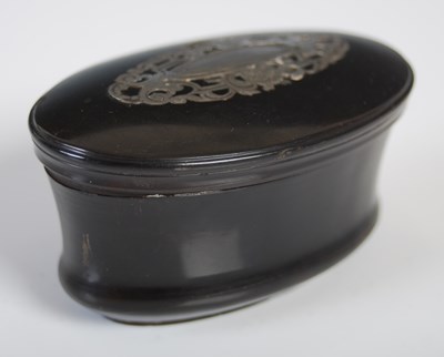 Lot 278 - A tortoiseshell oval upright snuff box with...