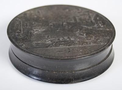 Lot 225 - A pressed horn circular snuff box, the...