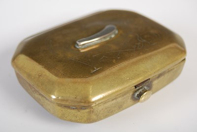 Lot 196 - A brass cut-cornered oblong snuff box, the...