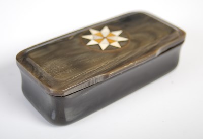 Lot 198 - A horn oblong snuff box with incurved sides...