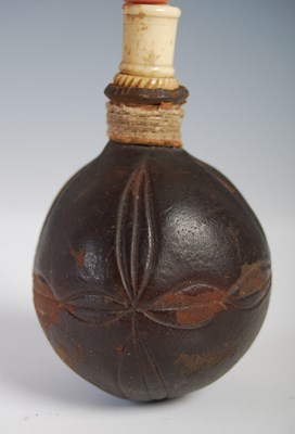 Lot 294 - A nut snuff flask gourd carved with stylised...