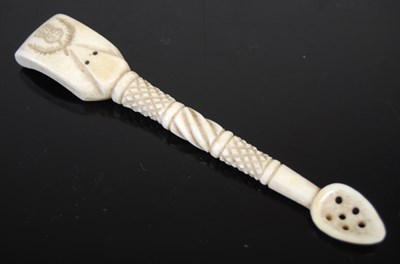 Lot 318 - A Scottish large bone snuff spoon with finely...