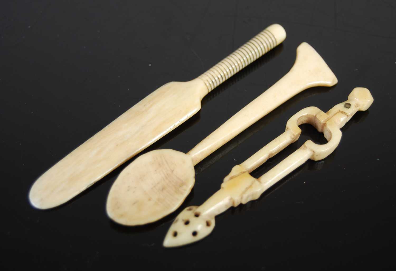 Lot 316 - Three Scottish bone snuff spoons, comprising