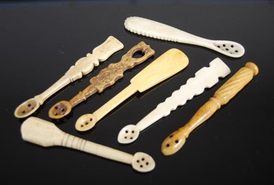 Lot 313 - A group of seven Scottish carved bone snuff...