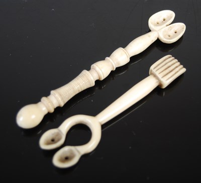 Lot 327 - Two unusual Scottish bone double snuff spoons;...