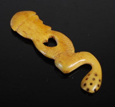 Lot 314 - An unusual Scottish bone snuff spoon carved as...