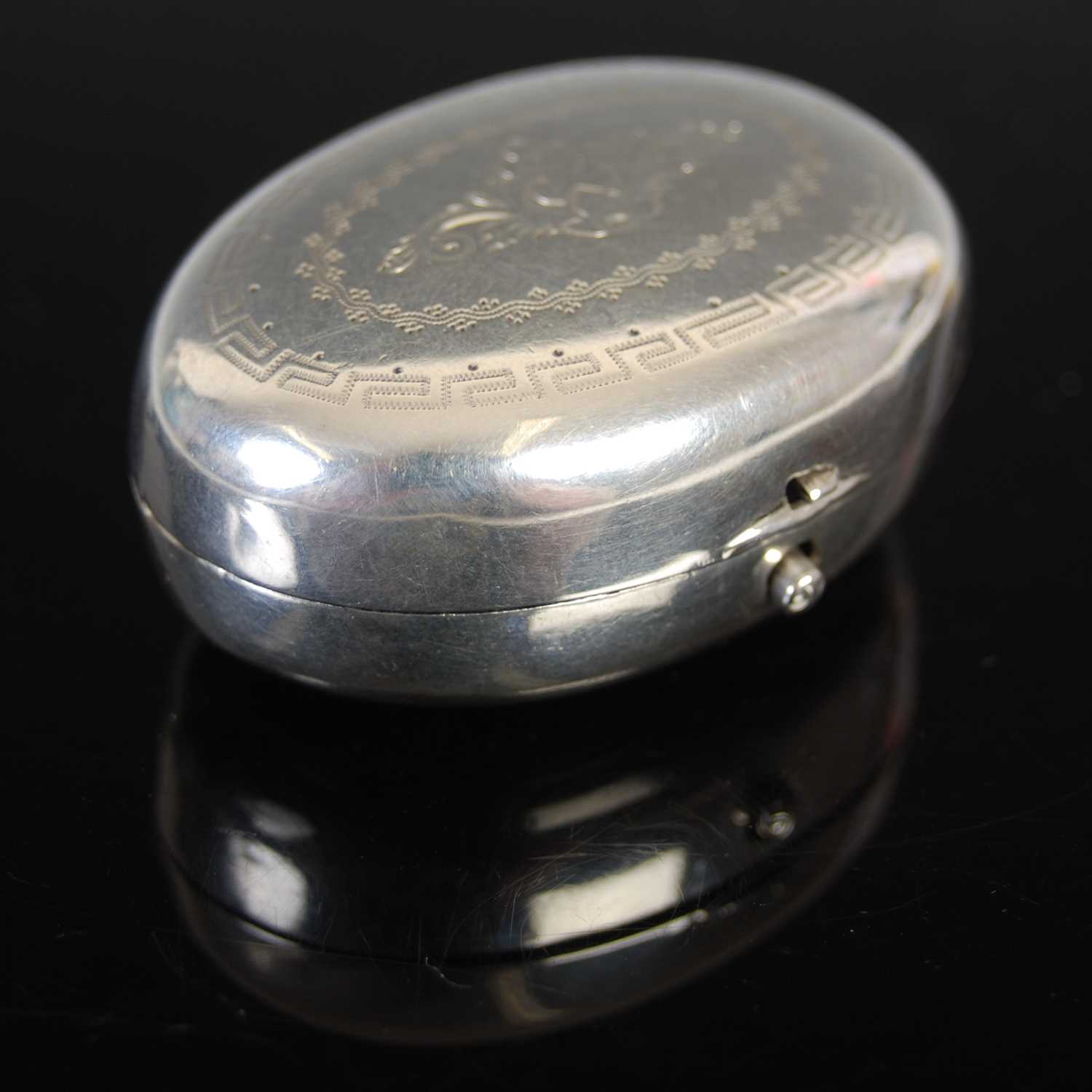 Lot 413 - A 19th century Dutch silver oval cachou box,...