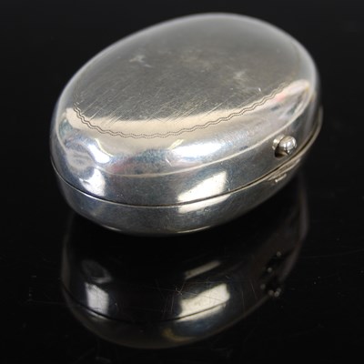 Lot 413 - A 19th century Dutch silver oval cachou box,...