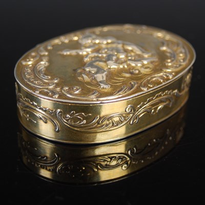 Lot 248 - A 19th century French silver-gilt oval snuff...