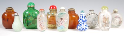 Lot 591 - A collection of eleven Chinese snuff bottles,...