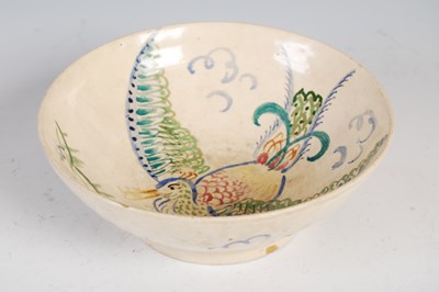 Lot 534 - A painted pottery bowl in the style of Roger...