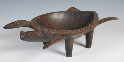 Lot 150 - A Fijian carved wood kava bowl formed as a...