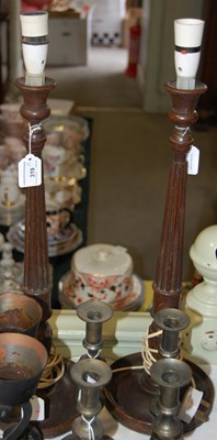 Lot 319 - A pair of turned wooden candlesticks,...