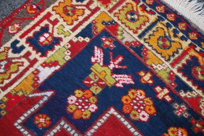 Lot 96 - A Turkish rug, 20th century, the rectangular...