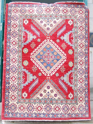 Lot 983 - An Afghan Kazak rug, 20th century, the...