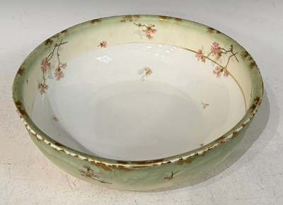 Lot 317 - A large Limoges porcelain wash basin with hand-...