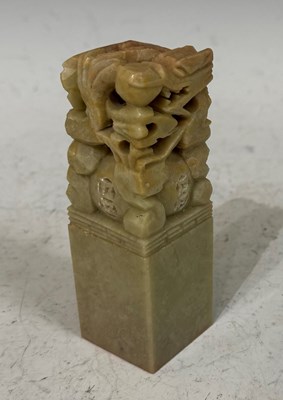 Lot 4 - A Chinese soapstone seal with carving of a...