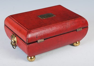 Lot 136 - A George III red leather sarcophagus shaped...