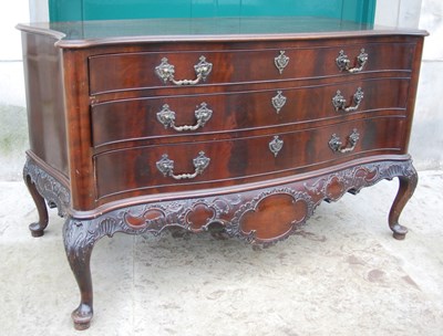 Lot 79A - A late George III style mahogany serpentine...