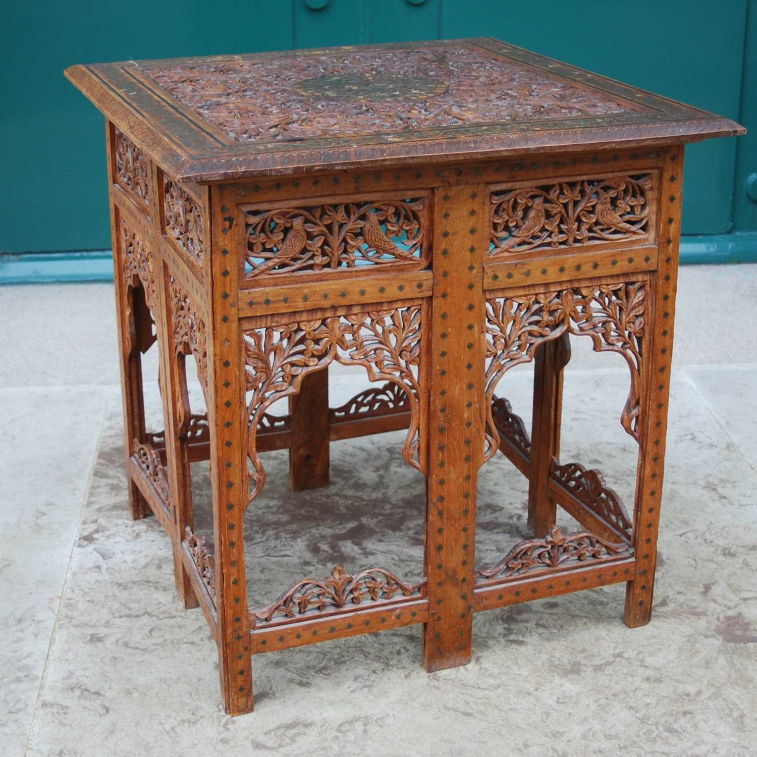 Lot 79 - A late 19th / early 20th century Indian carved...