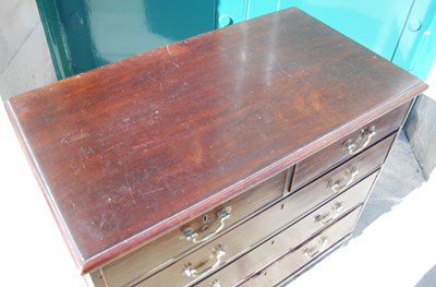 Lot 73 - A George III mahogany chest, fitted with two...