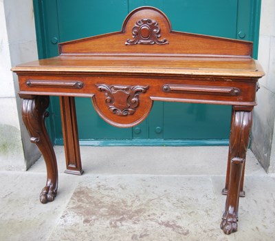 Lot 15 - A 19th century oak console table, the upright...