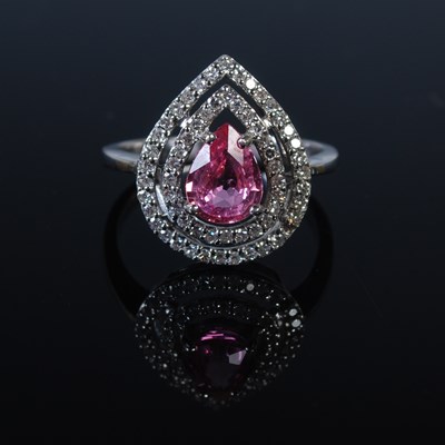 Lot 41 - An 18ct gold Padparadscha colour sapphire and...