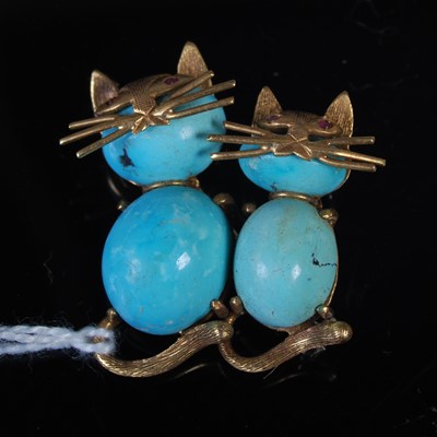 Lot 67 - A yellow metal mounted turquoise cabochon...