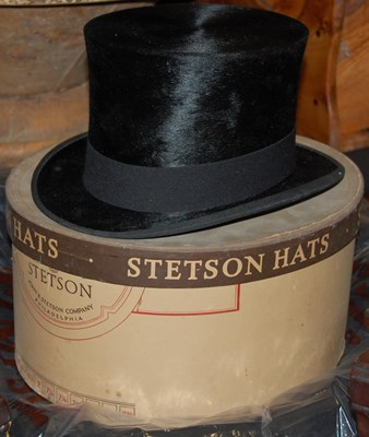 Lot 715 - A vintage top hat, size 7 ¼, interior marks...