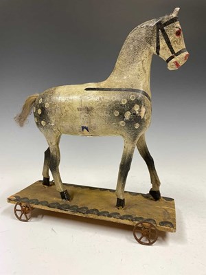 Lot 146 - A 19th century childs pull-along toy horse,...