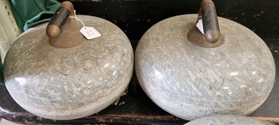 Lot 897 - A pair of granite curling stones.