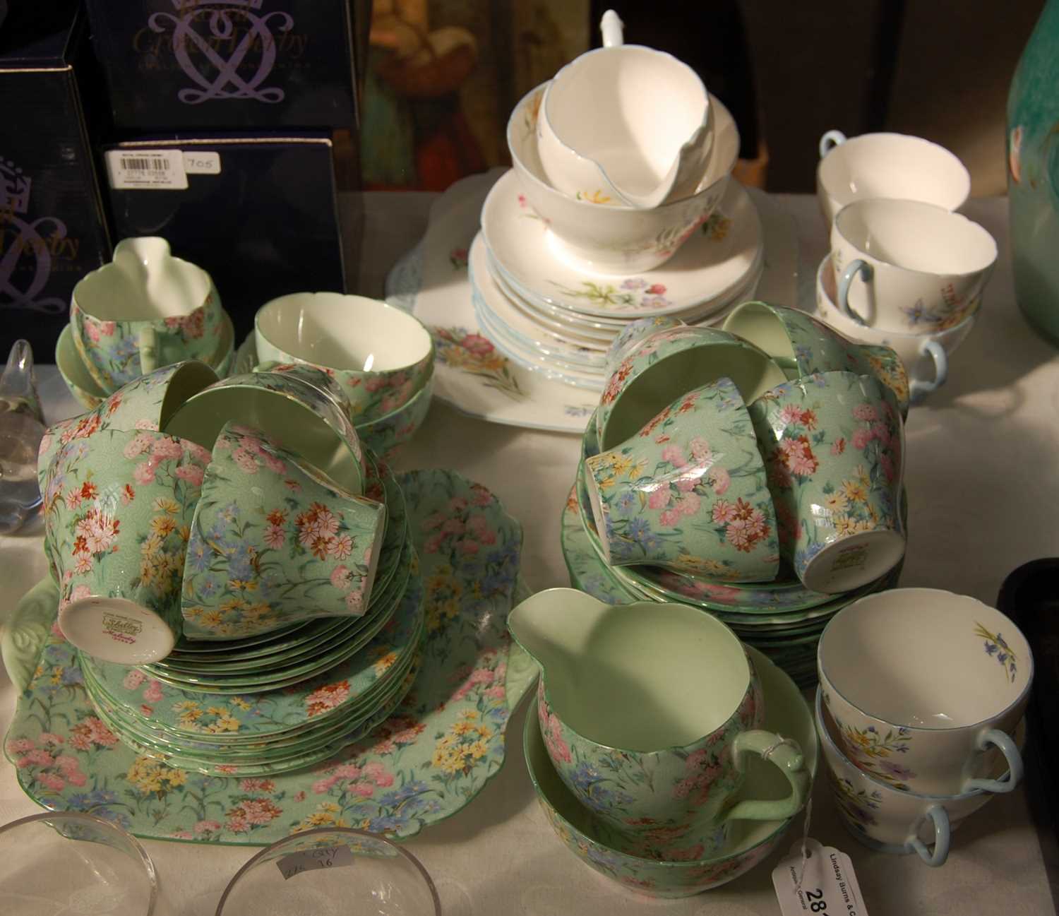 Lot 281 - A Shelley “Melody” pattern part tea service,...