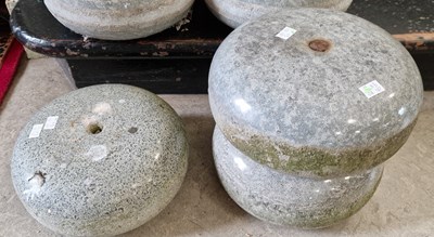 Lot 898 - Three granite curling stones (lacking handles).