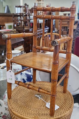 Lot 544 - A late Victorian faux bamboo dolls chair.