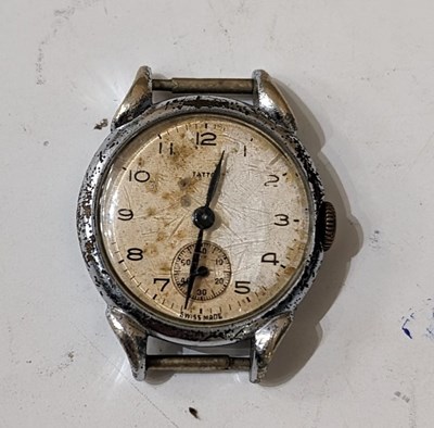 Lot 69 - A vintage gun metal open faced fob watch with...
