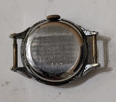 Lot 69 - A vintage gun metal open faced fob watch with...