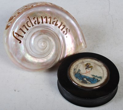 Lot 103 - A 19th century circular snuff box and cover,...