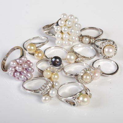 Lot 335 - Twelve silver and white metal pearl set dress...