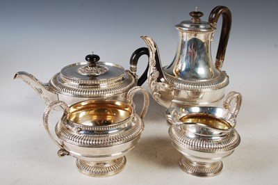 Lot 123 - A George V four piece silver tea and coffee...