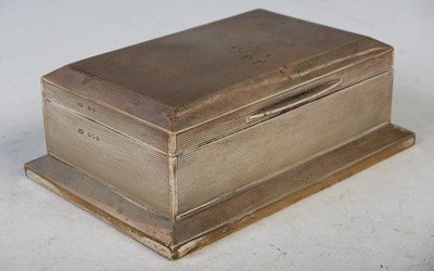 Lot 201 - A George V silver cigarette box, London, 1927...